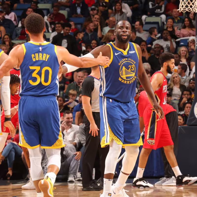 Stephen Curry, Draymon Green y Jordan Poole, en un partido de esta temporada