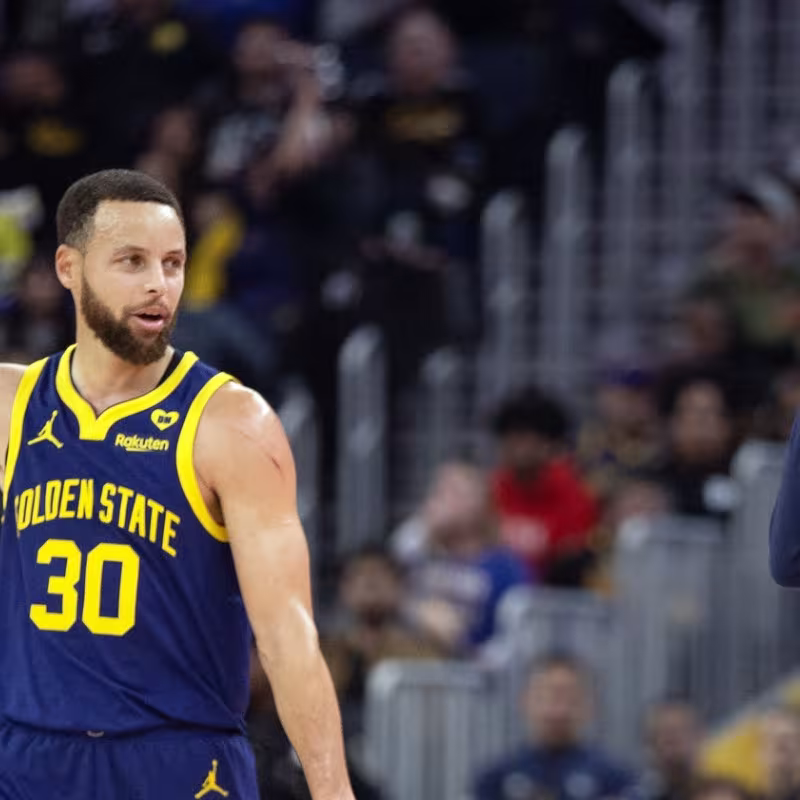 Stephen Curry y Steve Kerr, estrella y entrenador de Golden State Warriors.