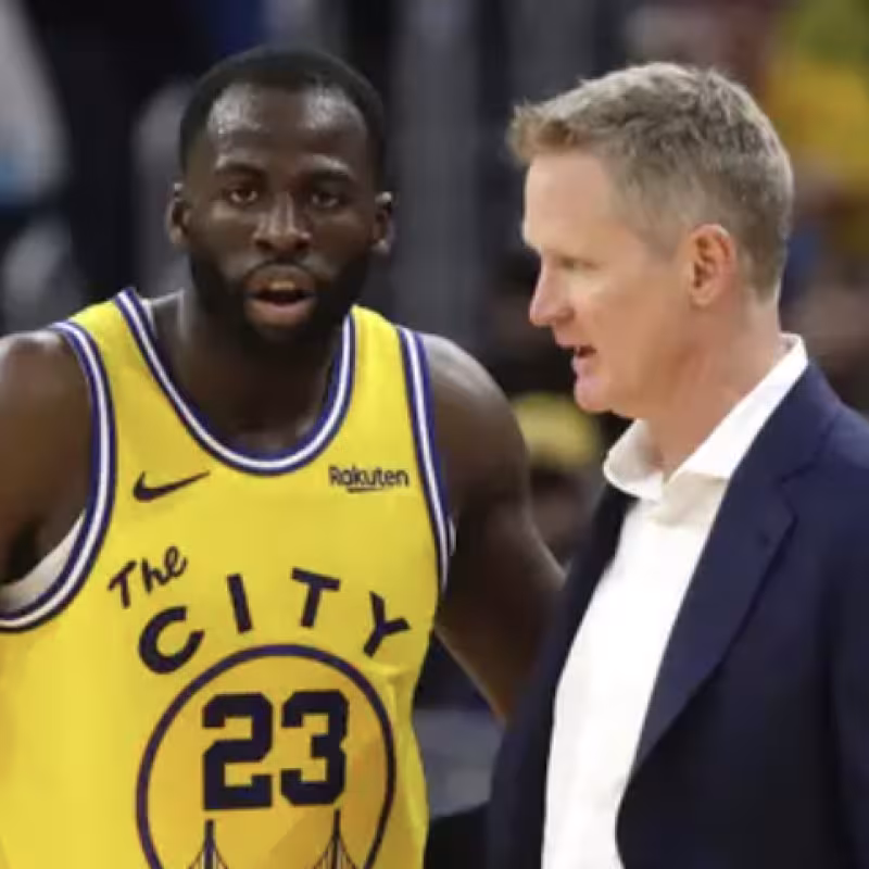 Draymond Green, junto a su entrenador en Golden State Warriors Steve Kerr.