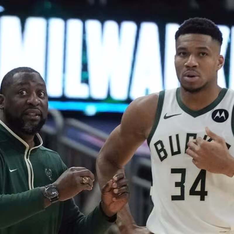 Adrian Griffin and Giannis Antetokounmpo