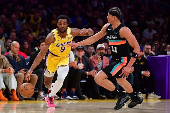 Bronny James playing in a basketball game.