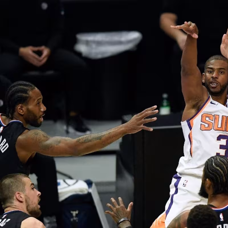 Kawhi Leonard y Chris Paul. Foto: gettyimages