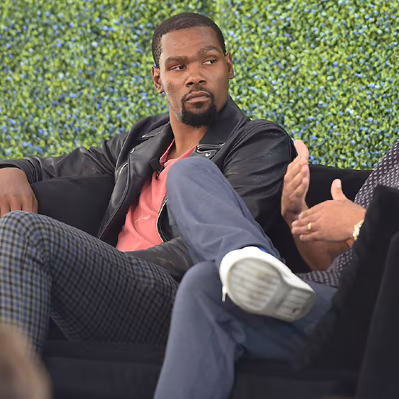 Kevin Durant, junto a su socio Rich Kleiman. 