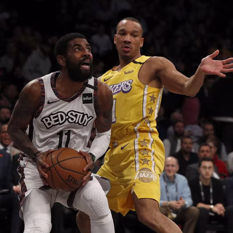 Kyrie Irving y Avery Bradley, durante un Nets-Lakers de la presente temporada.