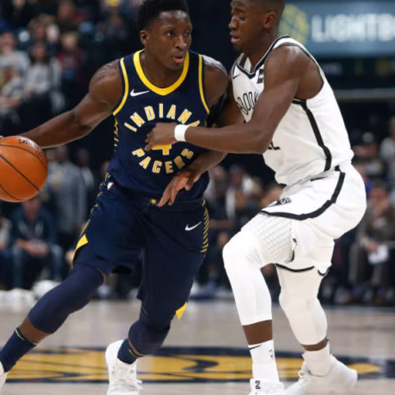 Victor Oladipo, frente a Caris LeVert.