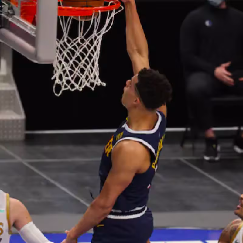 Michael Porter Jr. firmó un gran partido ante Luka Doncic.