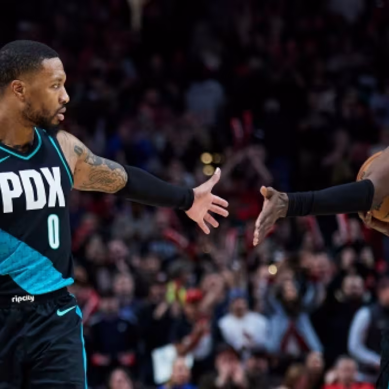 Damian Lillard y Jerami Grant