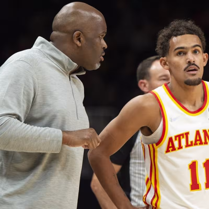 Nate McMillan y Trae Young