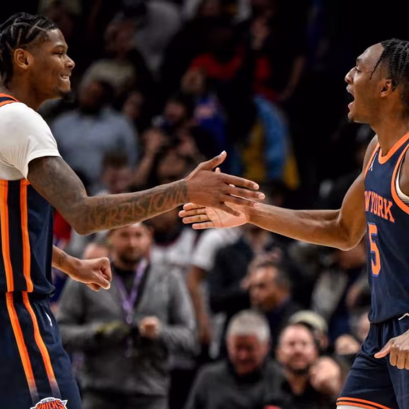 Immanuel Quickley y Cam Reddish