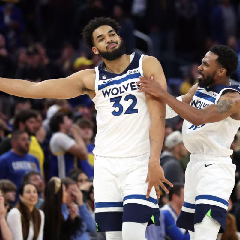 Karl-Anthony Towns y Mike Conley