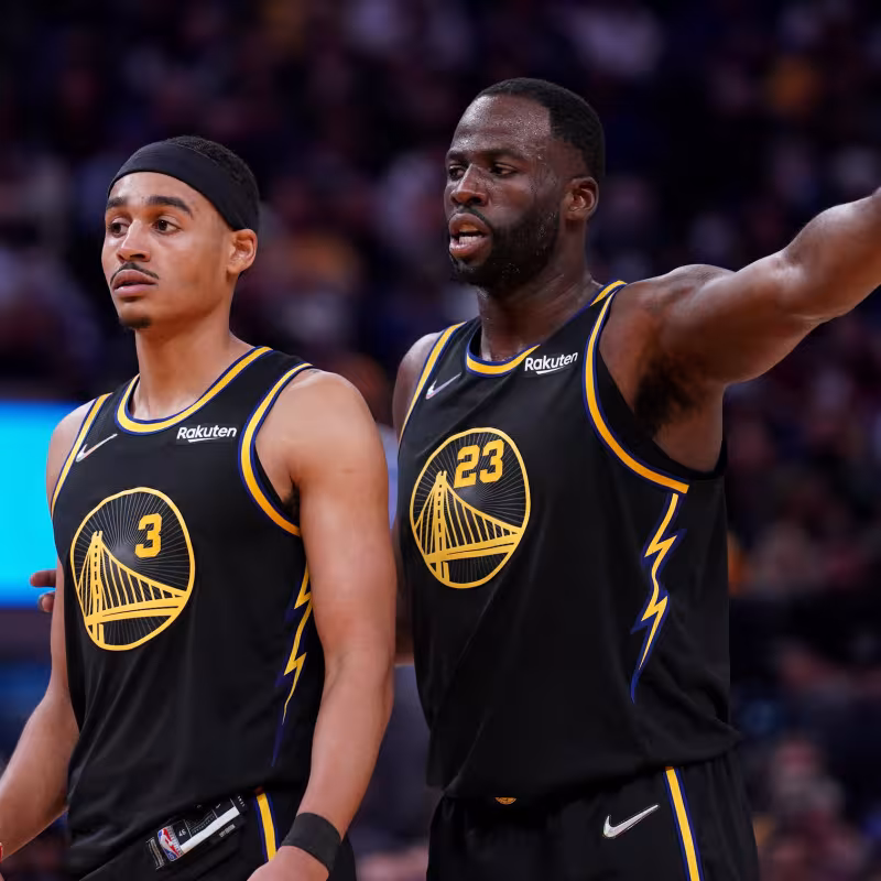 Jordan Poole y Draymond Green