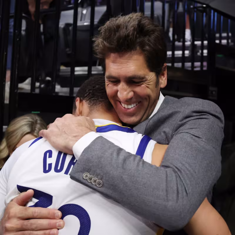 Stephen Curry y Bob Myers
