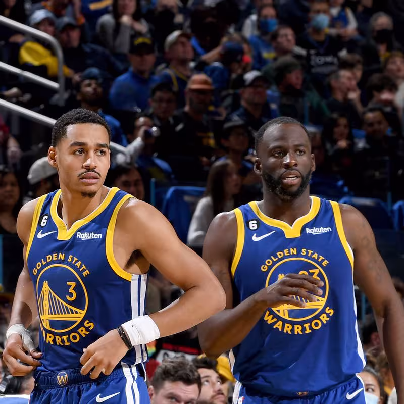 Jordan Poole y Draymond Green
