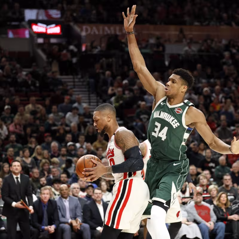 Damian Lillard y Giannis Antetokounmpo
