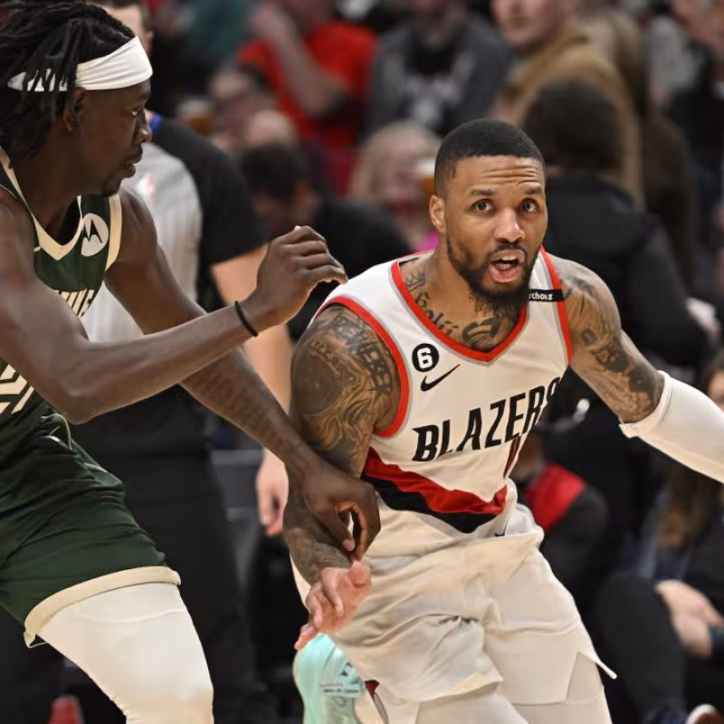Damian Lillard, defendido por Jrue Holiday