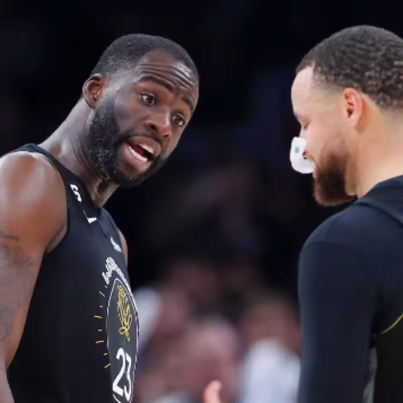 Draymond Green, junto a Stephen Curry.