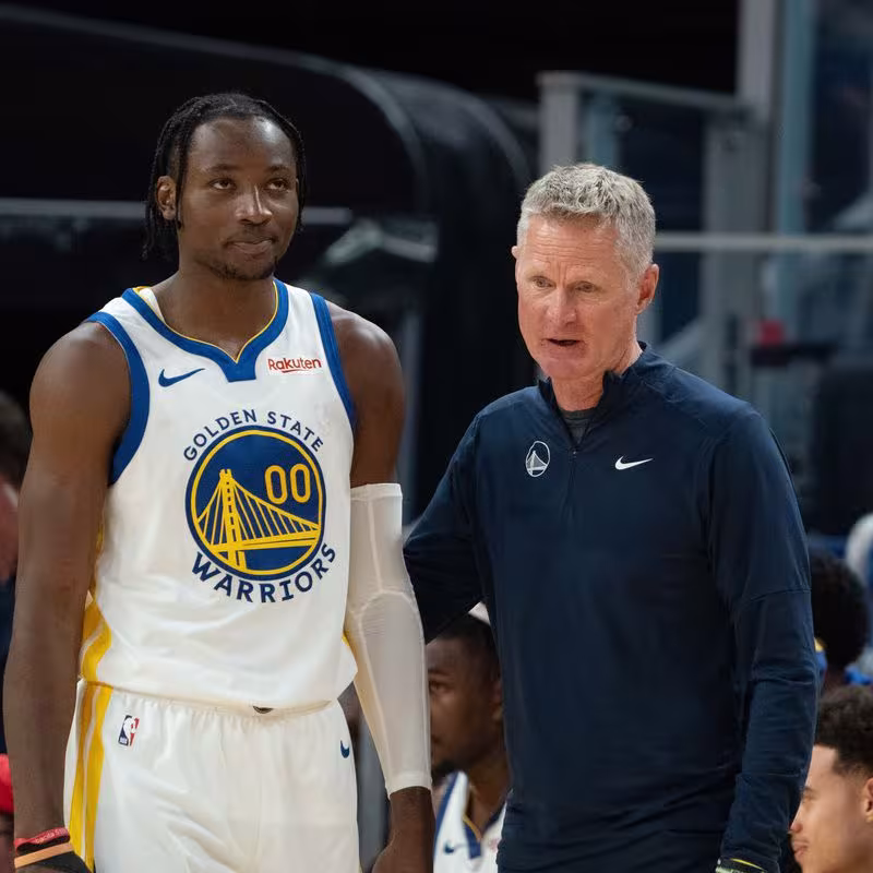 Jonathan Kuminga y Steve Kerr