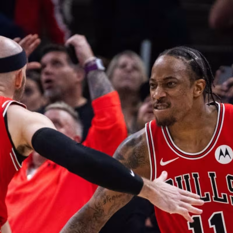 DeMar DeRozan and Alex Caruso, former players of the Chicago Bulls.