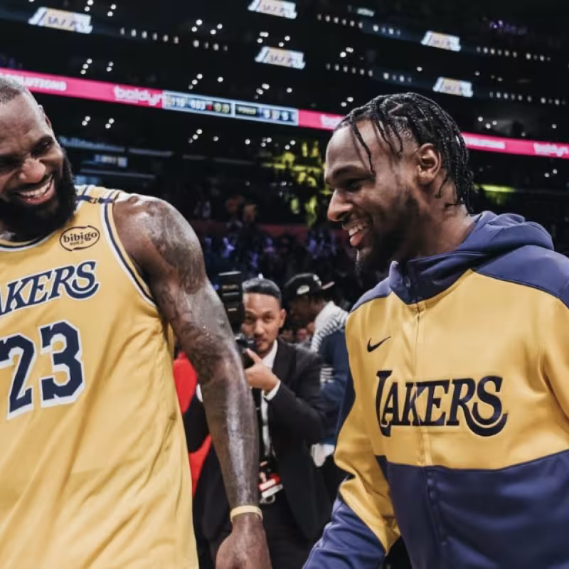 LeBron James, alongside Bronny James after his first NBA basket.
