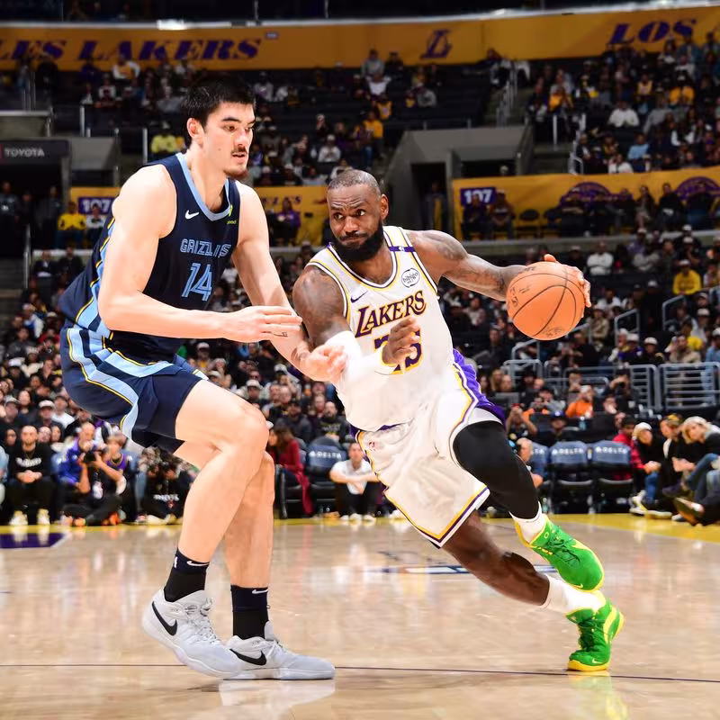 LeBron James defended by Zach Edey.