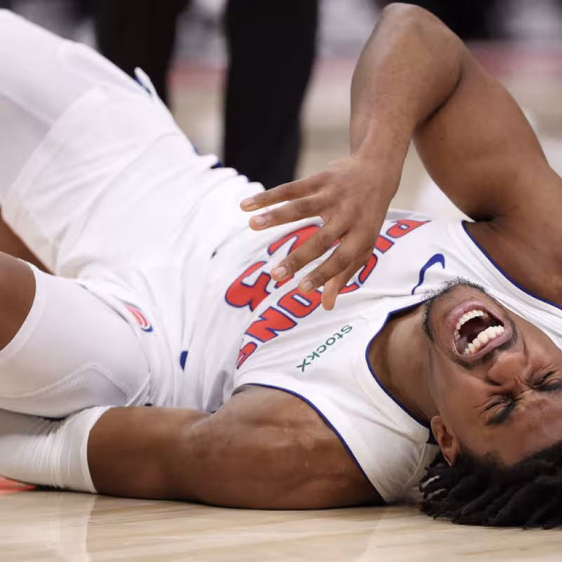 Jaden Ivey, broken with pain after suffering serious injury.