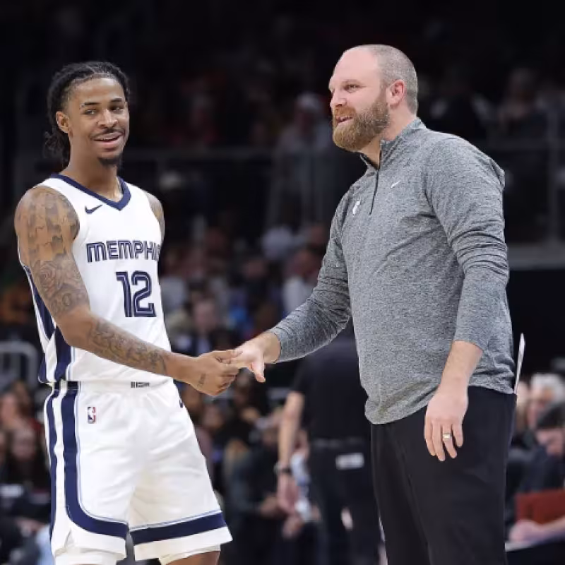 Taylor Jenkins, alongside Ja Morant.