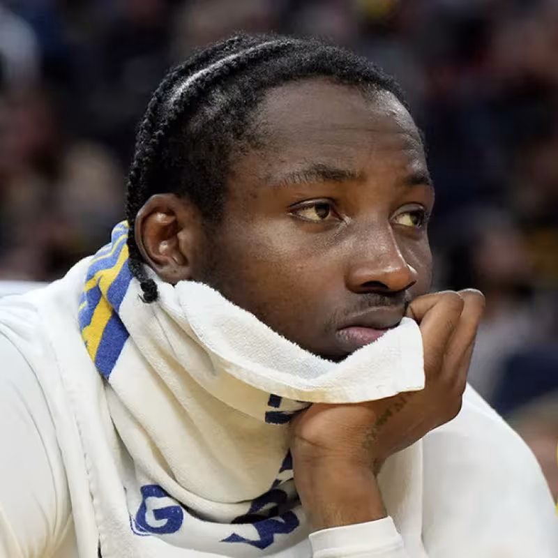 Jonathan Kuminga, wrapped in NBA rumors.