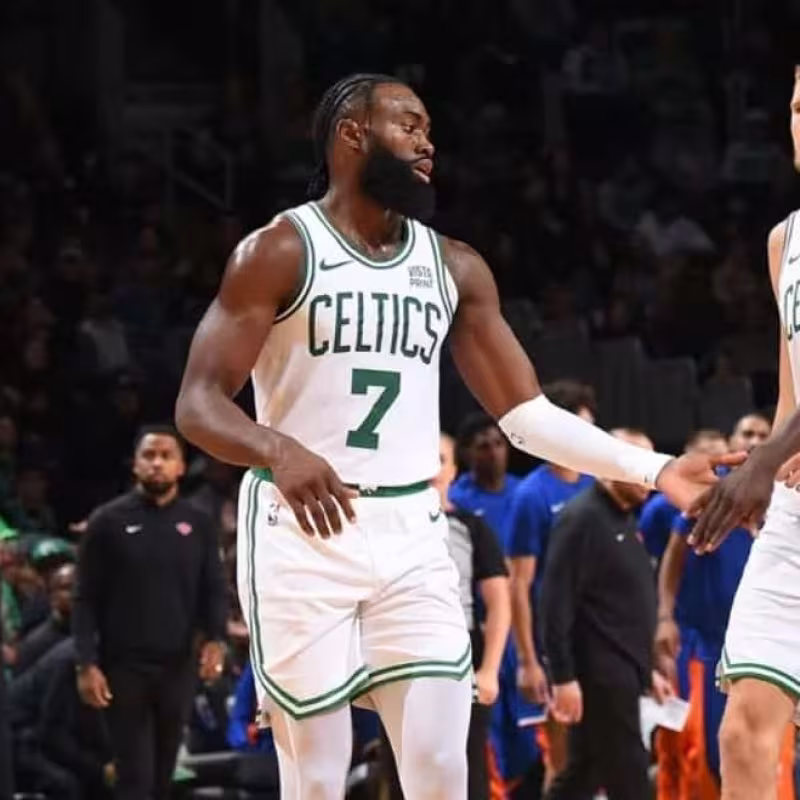 Jaylen Brown, Kristaps Porzingis, and Jrue Holiday.