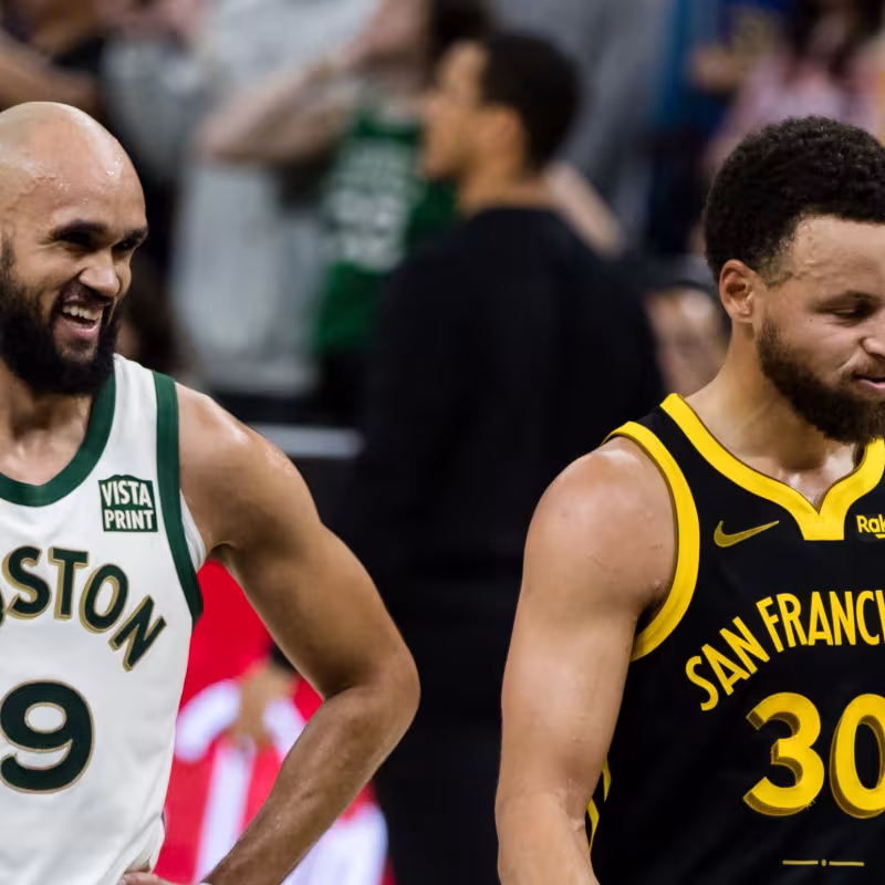 Derrick White and Stephen Curry