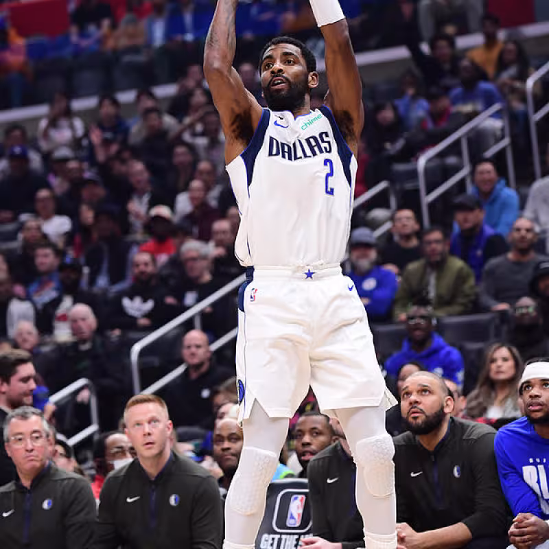 Kyrie Irving, shooting a three-pointer