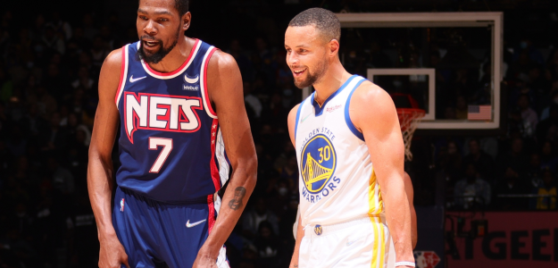 Kevin Durant y Stephen Curry, en un Warriors-Nets. 