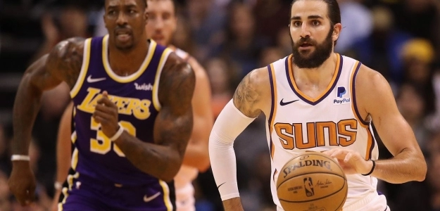 Ricky Rubio y Dwight Howard, en un Suns-Lakers de la presente temporada.