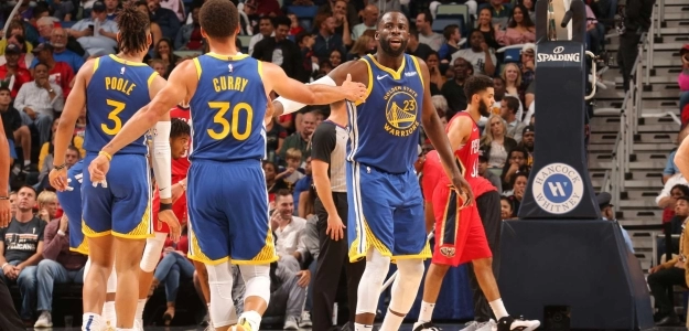 Stephen Curry, Draymon Green y Jordan Poole, en un partido de esta temporada