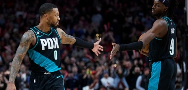 Damian Lillard y Jerami Grant