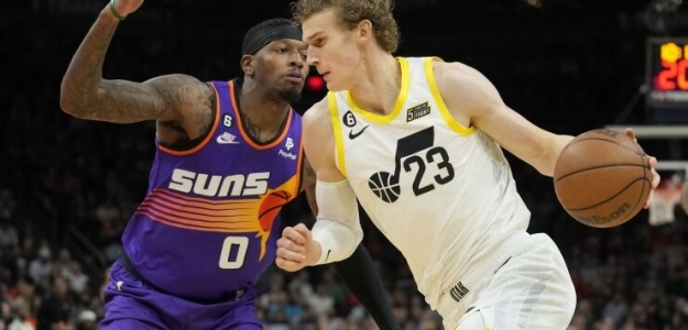 Lauri Markkanen, defendido por Torrey Craig