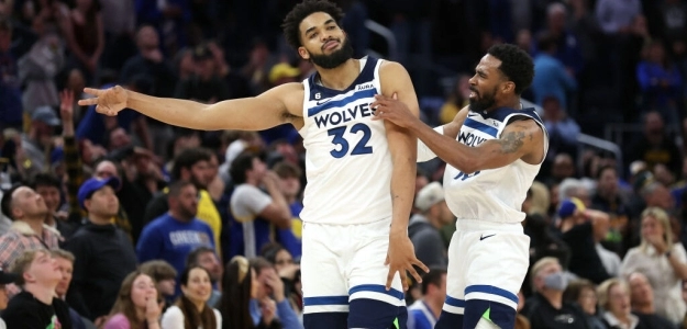 Karl-Anthony Towns y Mike Conley