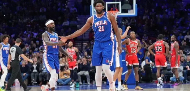 Patrick Beverley y Joel Embiid