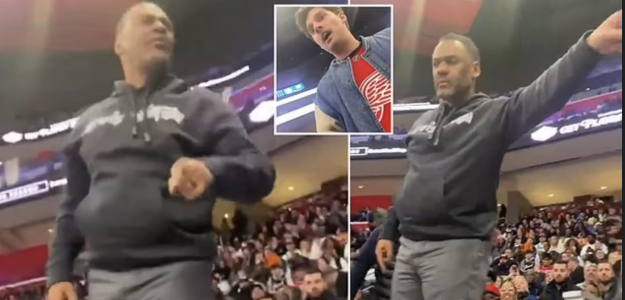 Troy Weaver, enfrentándose con un fan de los Pistons.