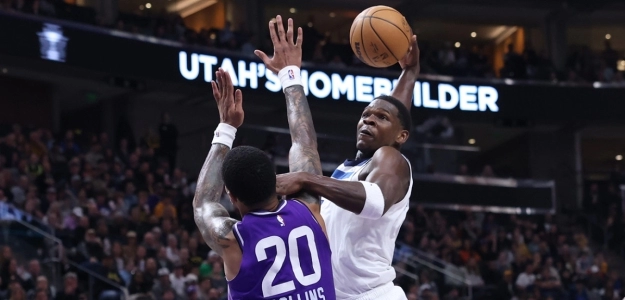 Anthony Edwards, posterizando a John Collins