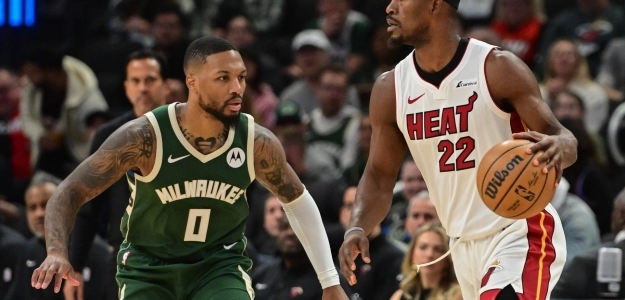 Damian Lillard, defendiendo a Jimmy Butler