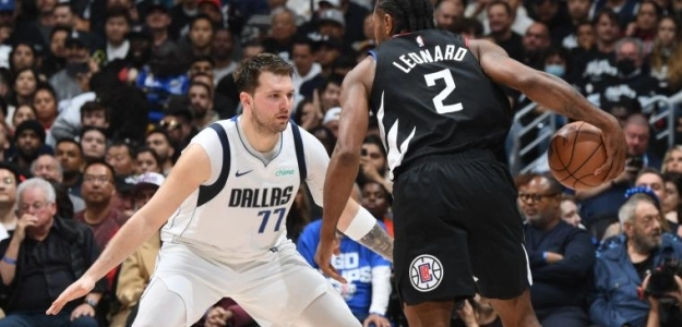 Luka Doncic, defendiendo a Kawhi Leonard