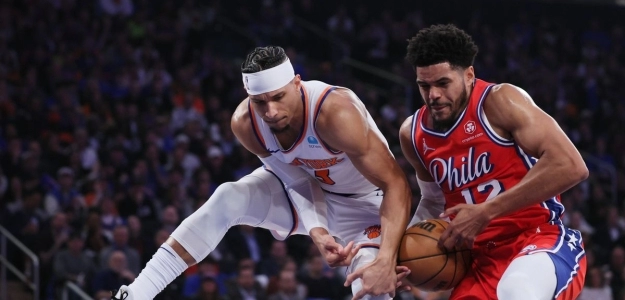 Tobias Harris, defendido por Josh Hart