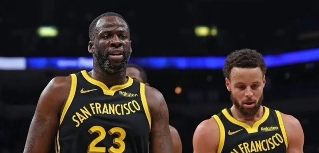 Draymond Green y Stephen Curry, jugadores de Golden State Warriors.