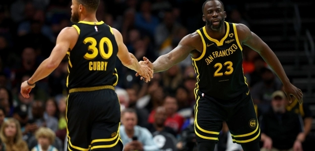 Stephen Curry y Draymond Green