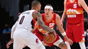 Aaron Gordon, defensa de Damian Lillard. Foto: gettyimages