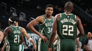 Giannis Antetokounmpo, Jrue Holiday y Khris Middleton.