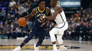 Victor Oladipo, frente a Caris LeVert.