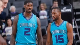 Kemba Walker y Marvin Williams, ex jugadores de Charlotte Hornets.