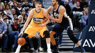 Nikola Jokic y Rudy Gobert