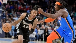 Ja Morant, defendido por Luguentz Dort